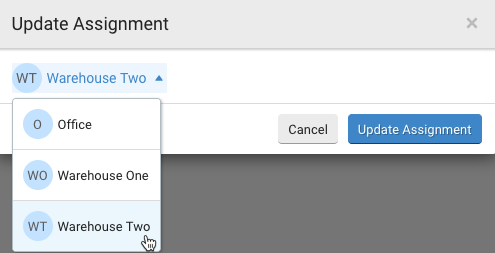 Batches: Update Assignment popup. Select User dropdown with Warehouse Two option selected. Update Assignment button at right.